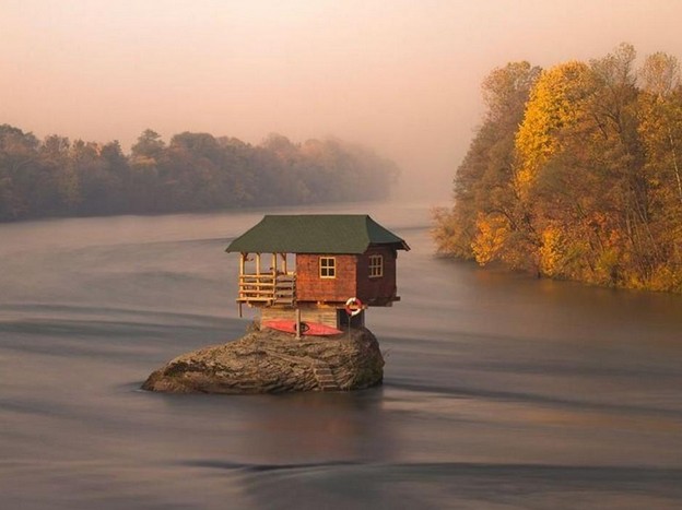 House Balancing on a Rock